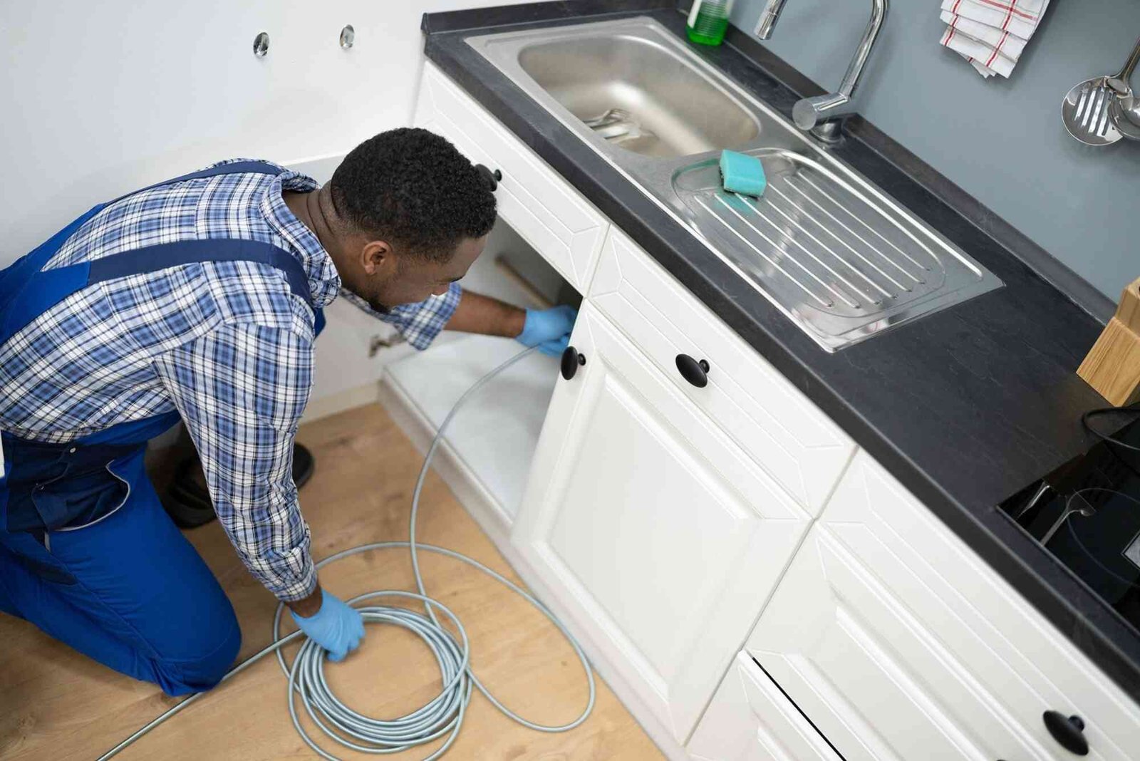 How to Unclog Dishwasher Drains Without a Plumber in JVC Dubai